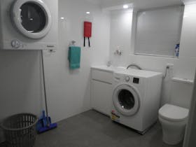 Fire extinguisher and fire blanket are fitted in the laundry.