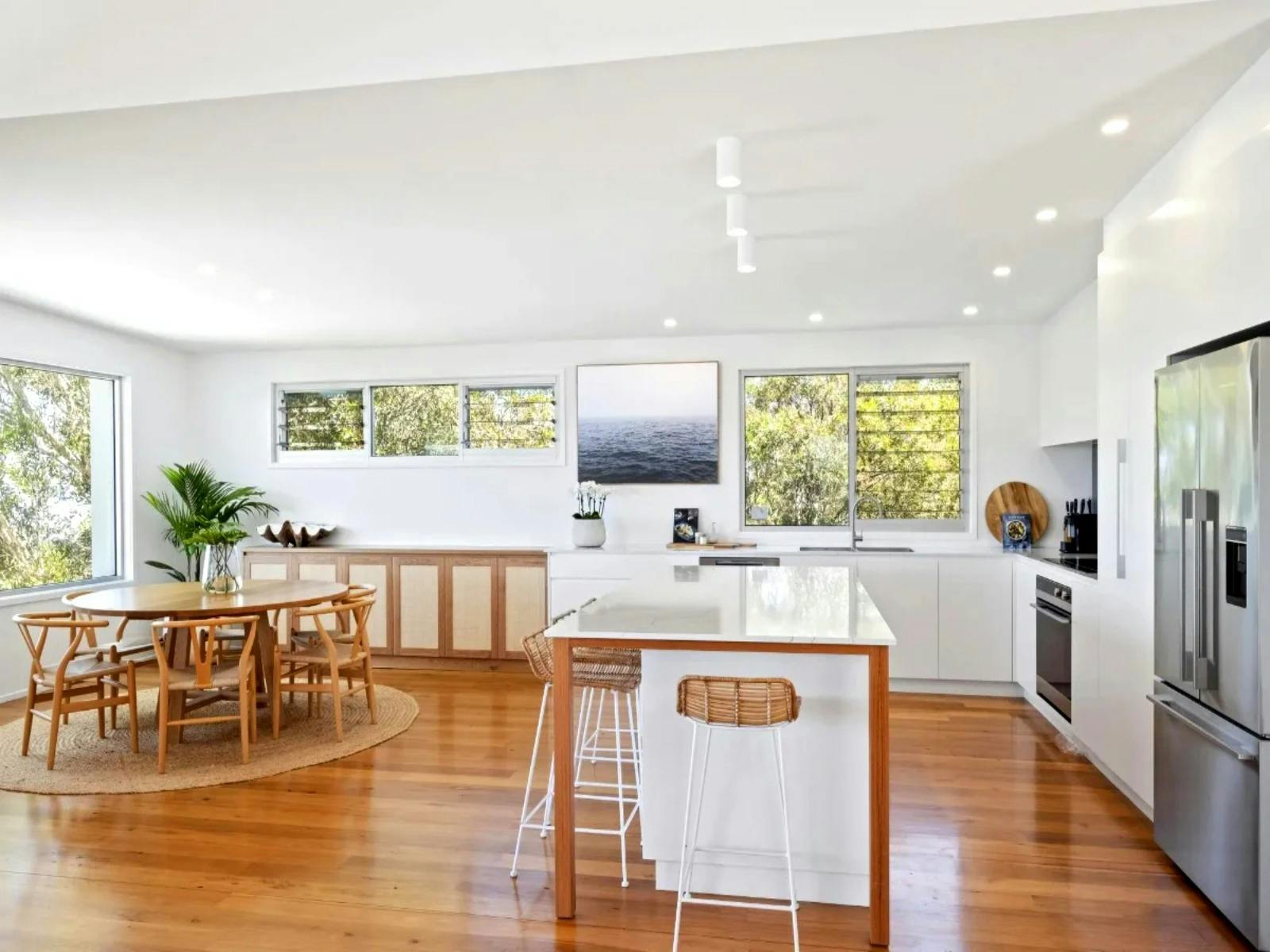 Open-plan kitchen and dining area designed for seamless interaction and entertaining