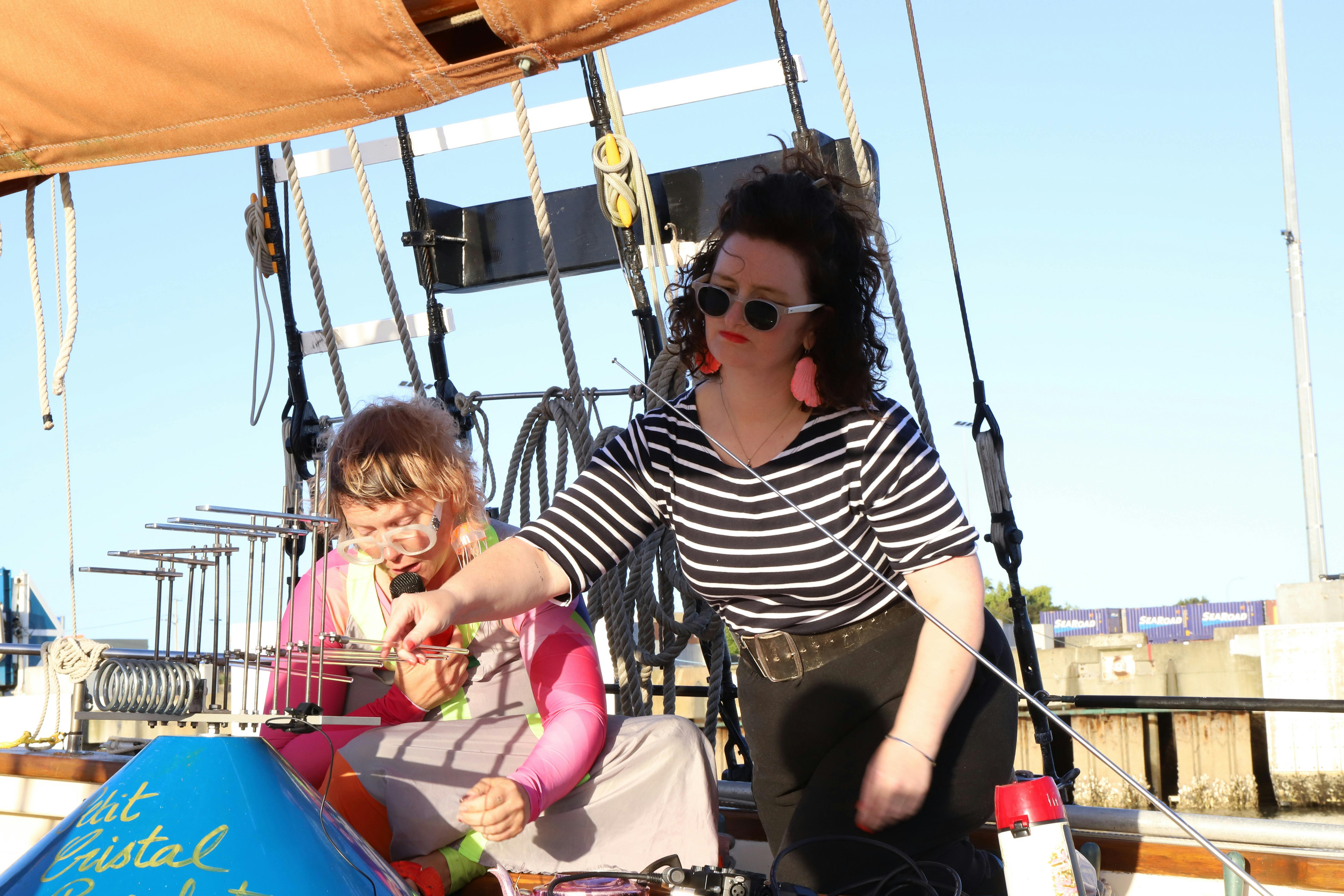 two ladies on a boat
