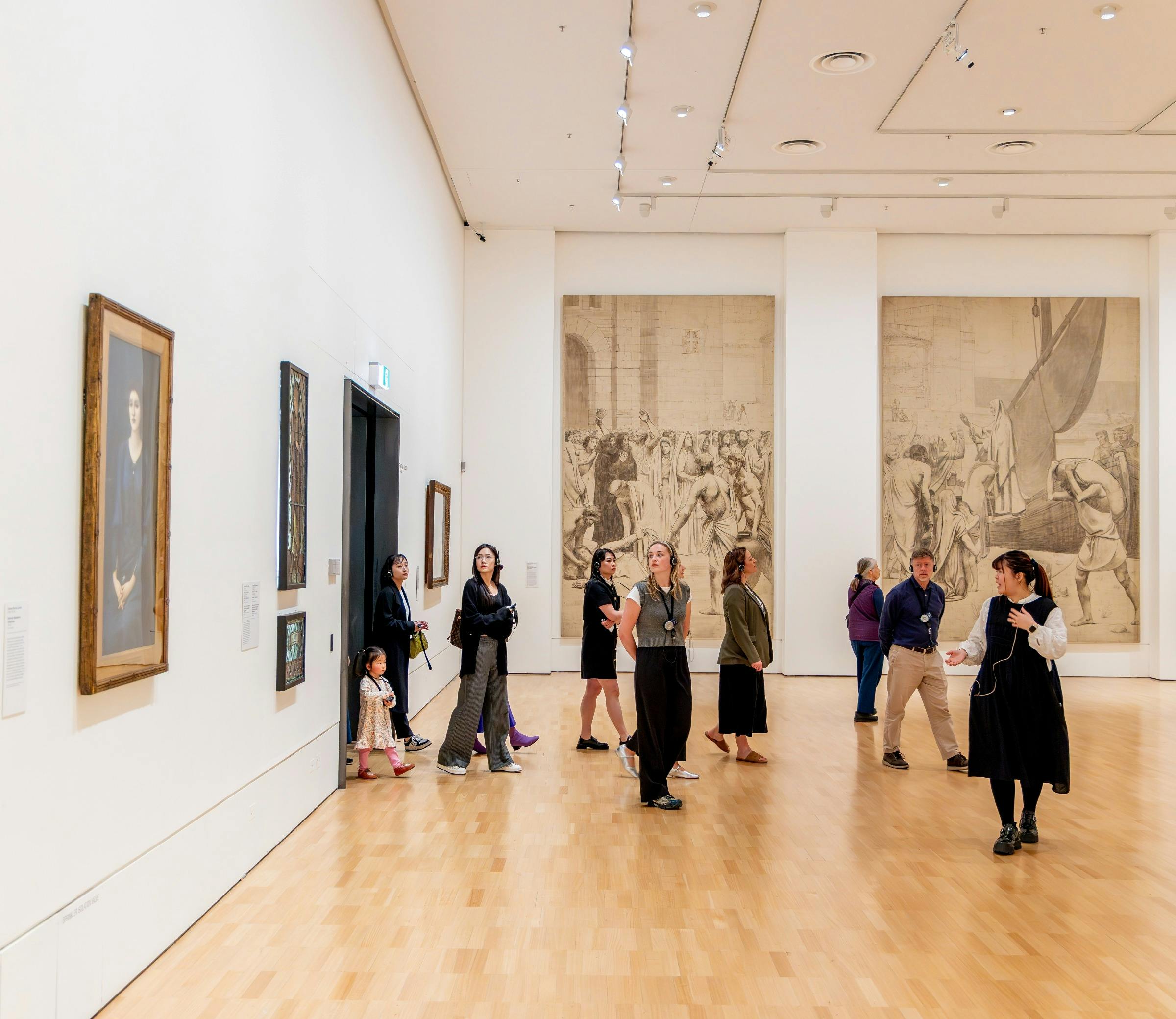 Visitors on a tour at the National Gallery of Victoria