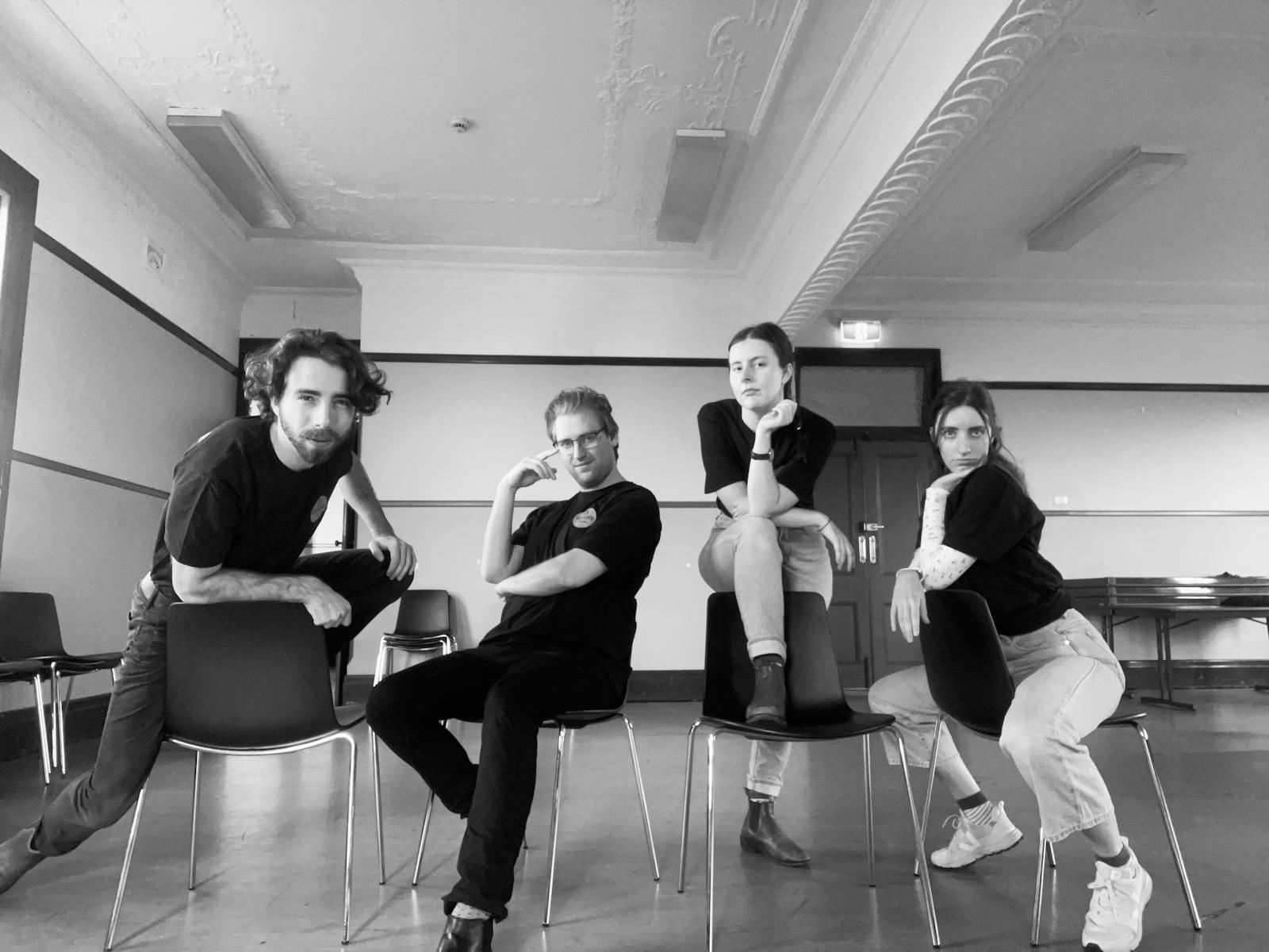 The four actors rehearse for the show