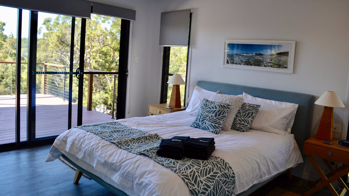 Master bedroom with ensuite opens to from deck