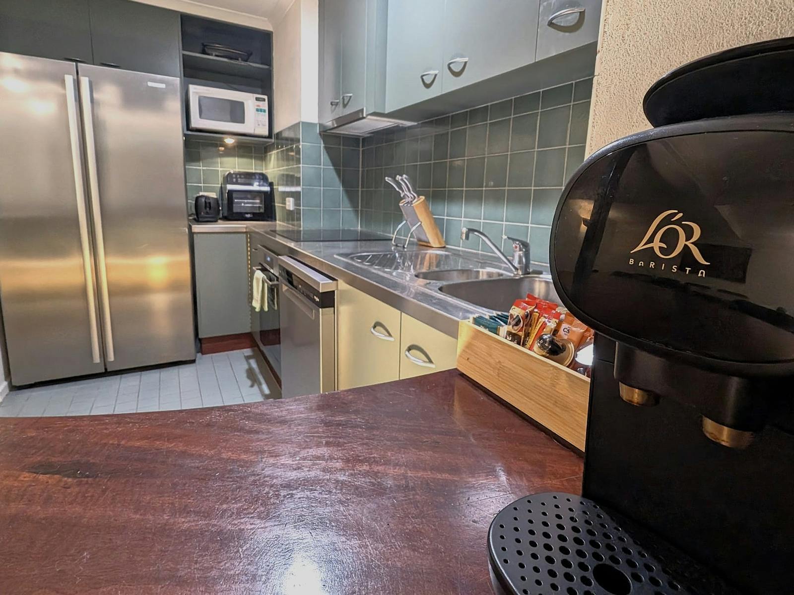 Kitchen with range of kitchen amenities