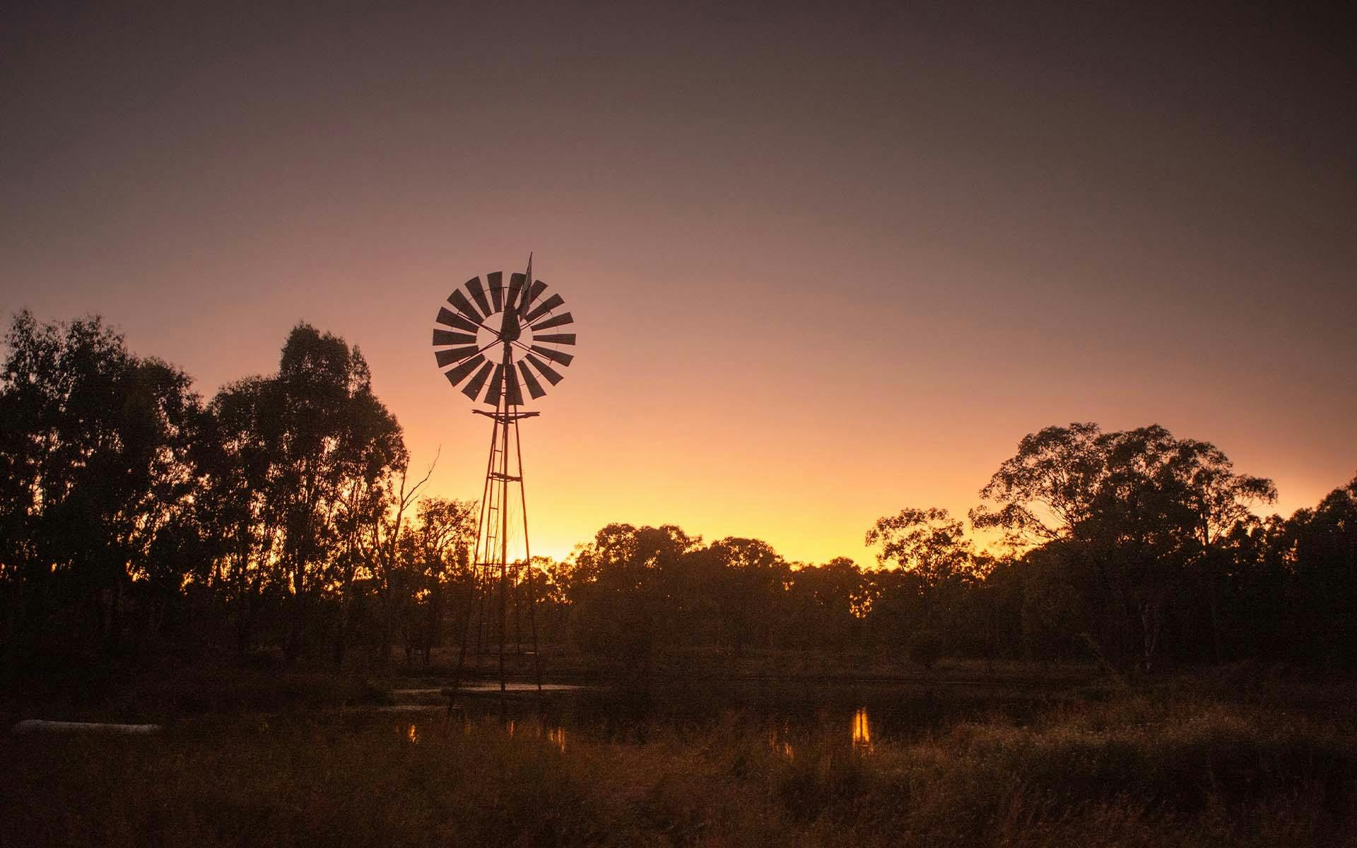 A silhouette of a windmill at Carnarvon Ranges