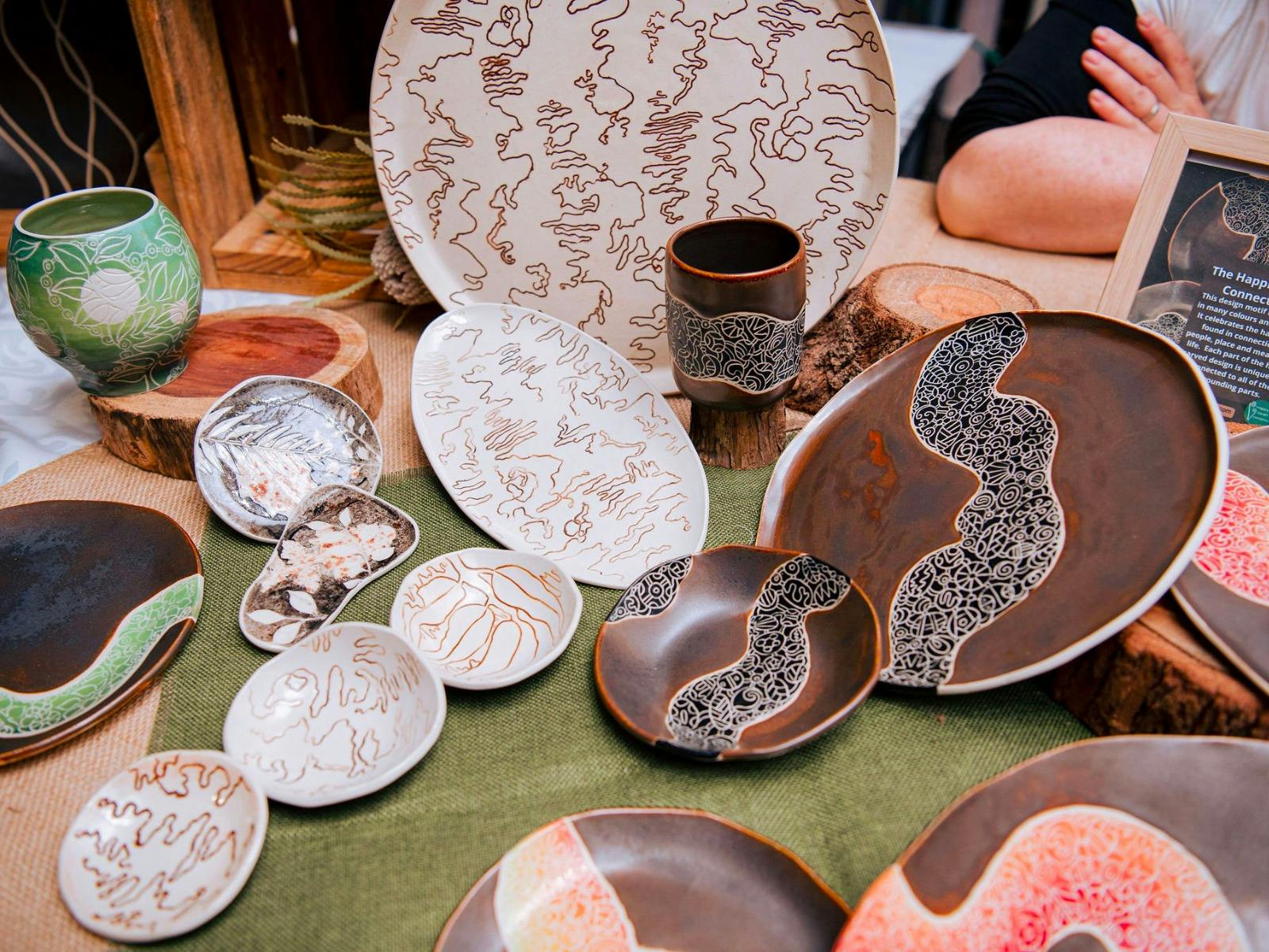 A selection of ceramic plates carved with a sqiggle gum pattern
