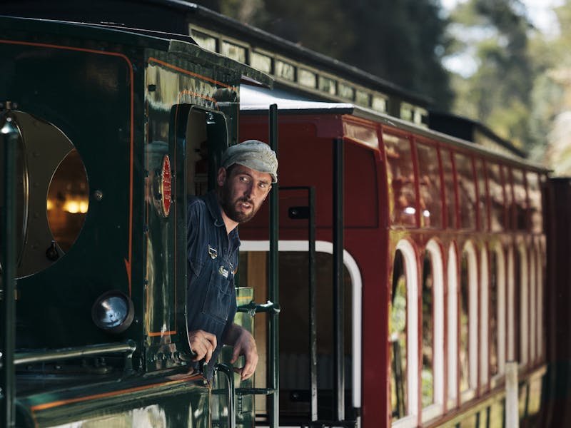 A locomotive driver prepares the West Coast Wilderness Railway for departure