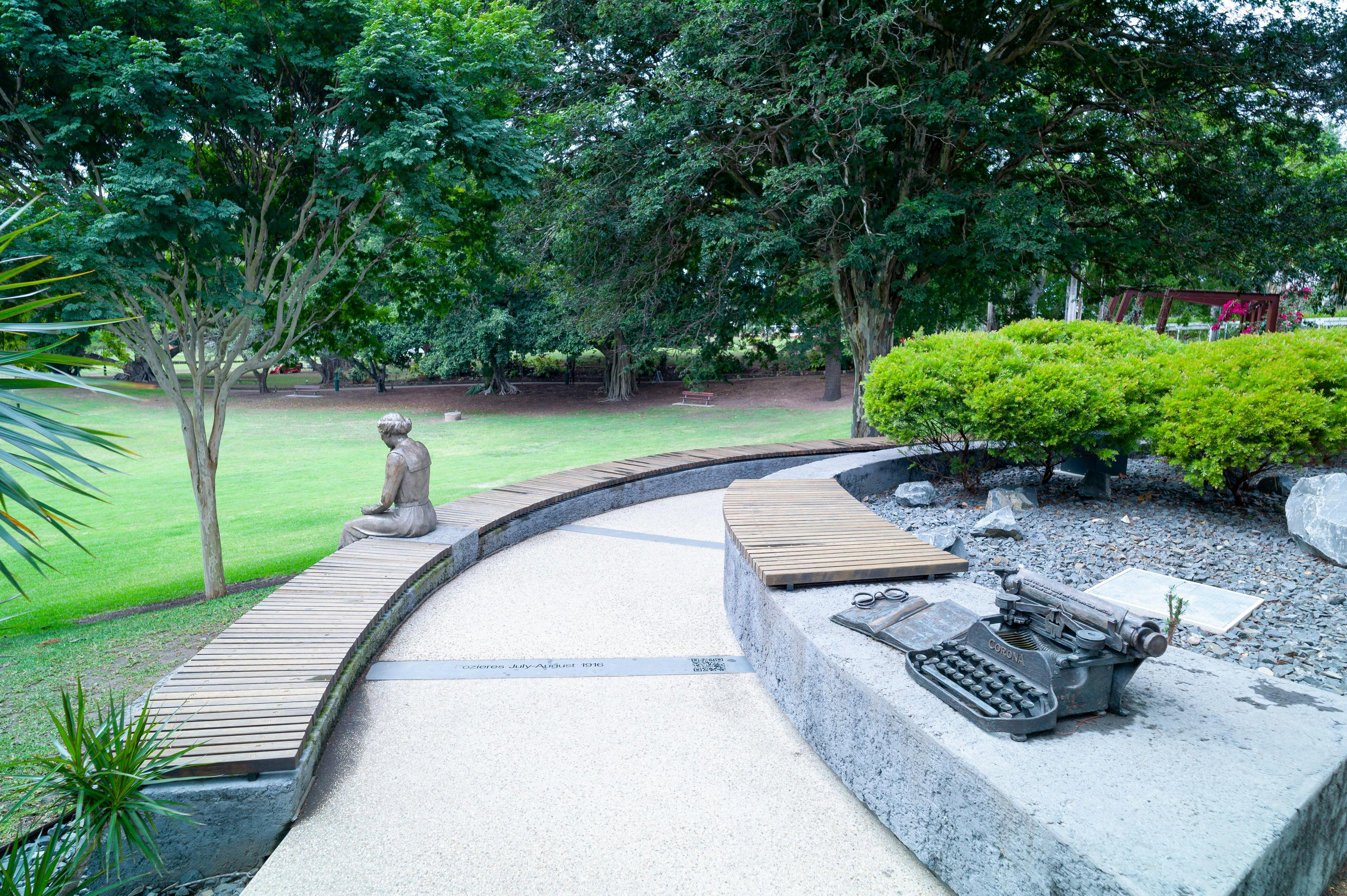 photo showing part of Gallipoloi to Armistice Walk with statue of woman sitting and staring blankly.