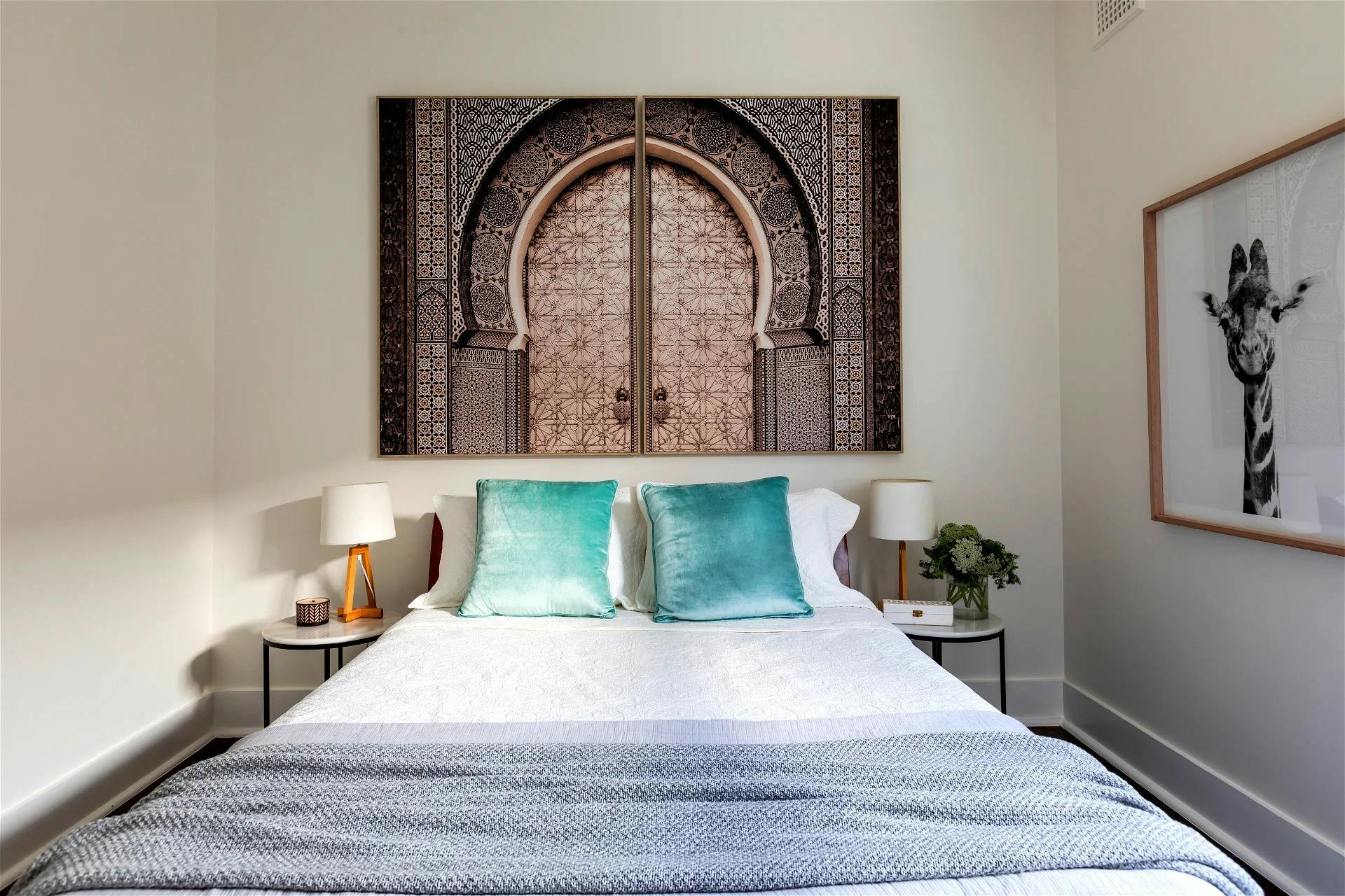 Inviting master bedroom with a plush king-size bed and elegant furnishings