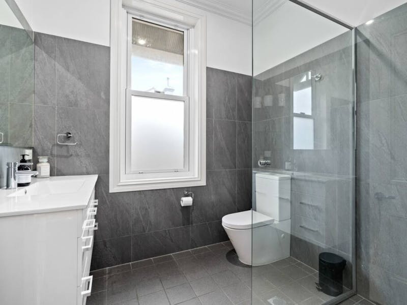 Bathroom with shower and toilet.