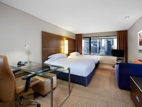 Wake up in this modern and comfortable 32 sq. m/344 sq. ft. Hilton Guest Room, enjoy the city views