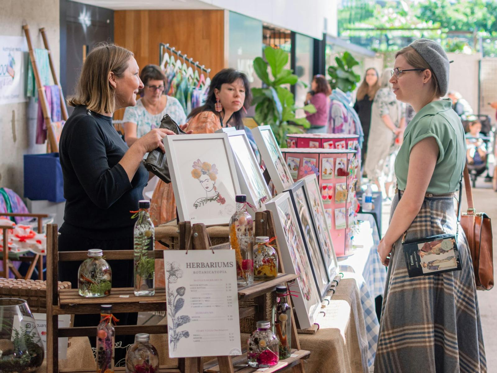 A Stallholder and shopper Talking at the Handmade Market