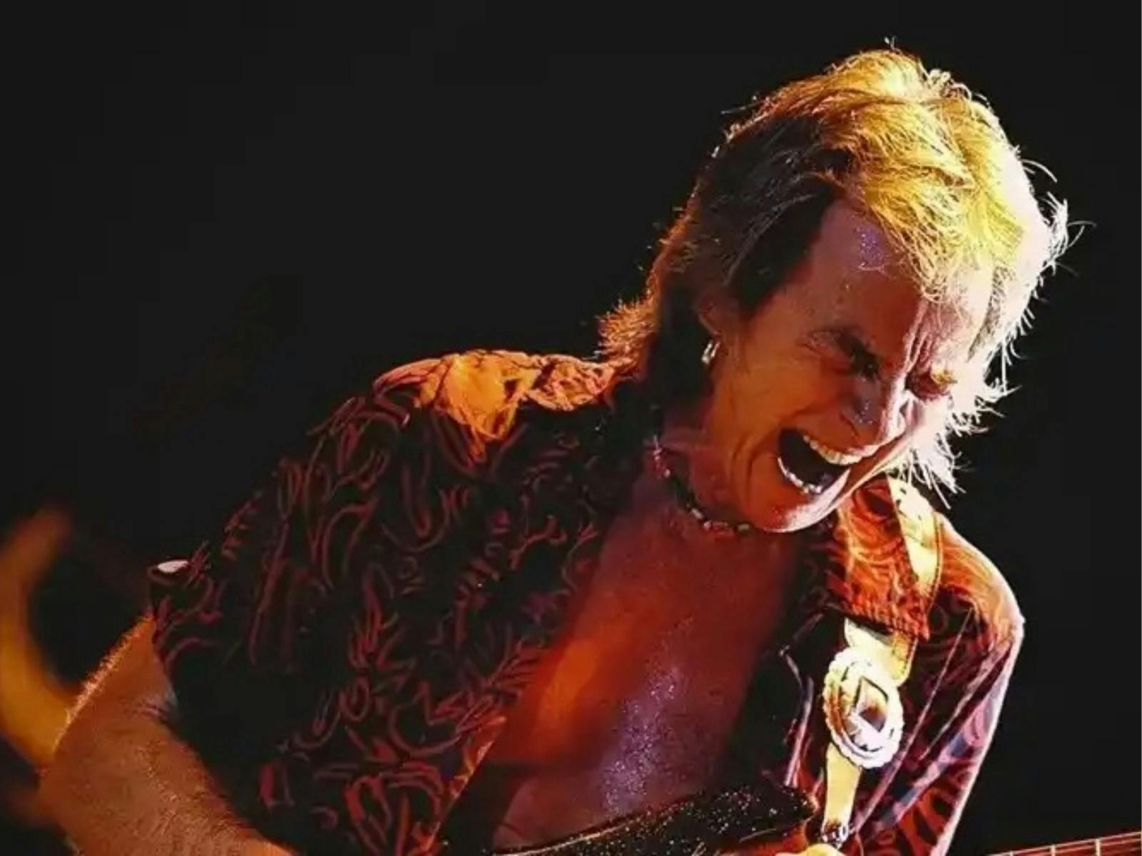 man playing the guitar