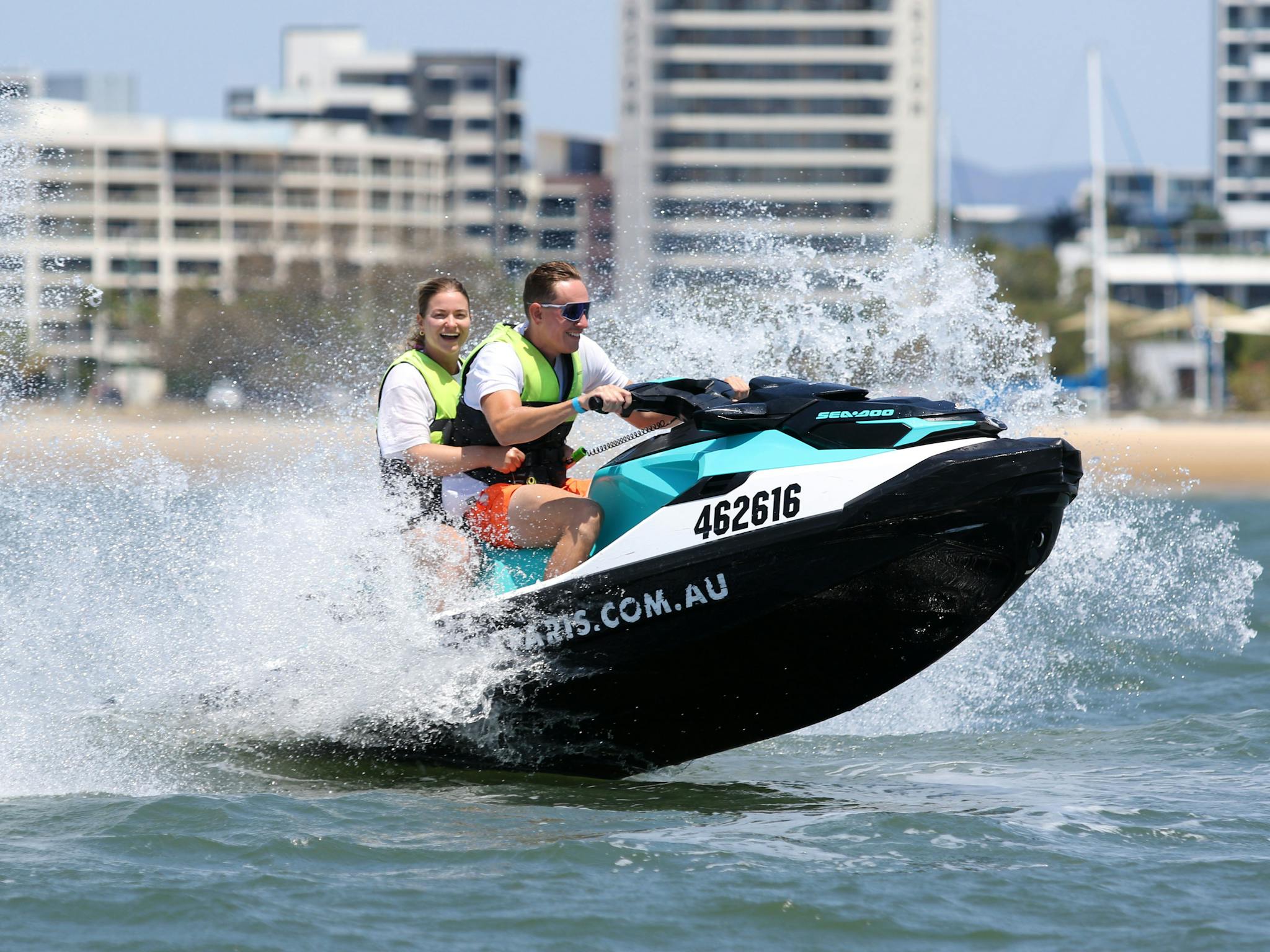 Couple having fun on a jet ski Couple having fun on a jet ski