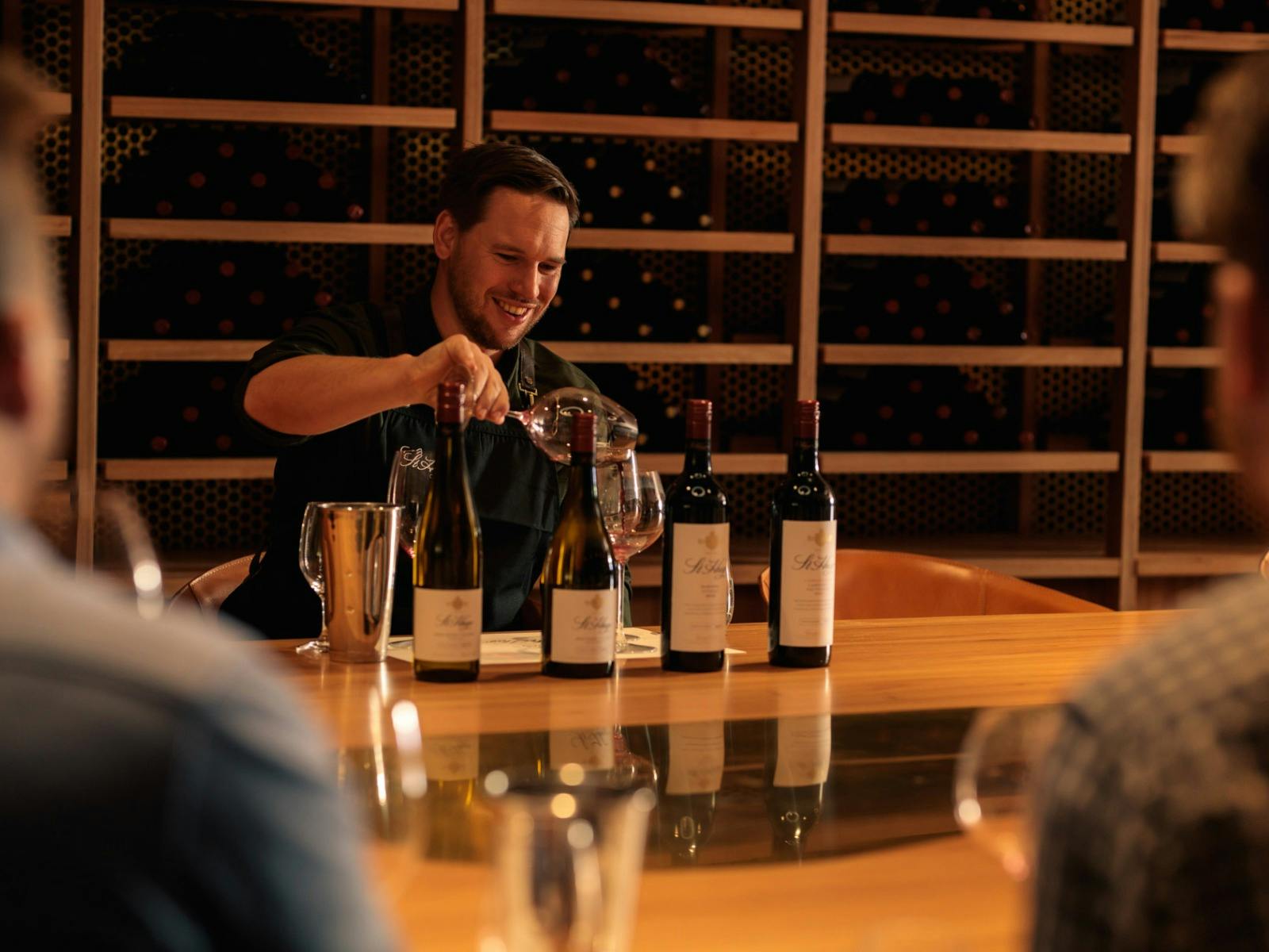 St Hugo team guiding guests through a wine tasting