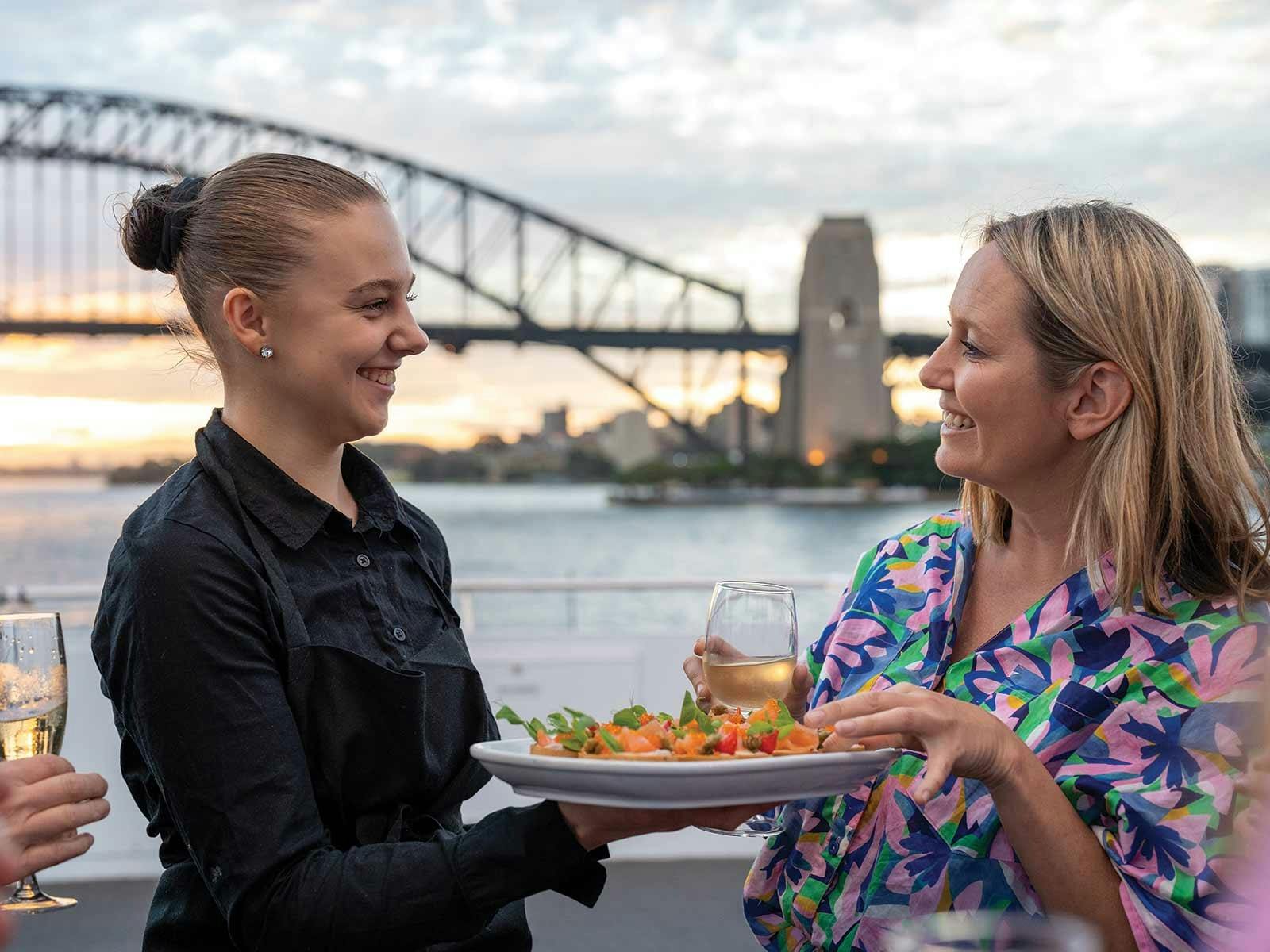 Guests enjoying a drink on the deck