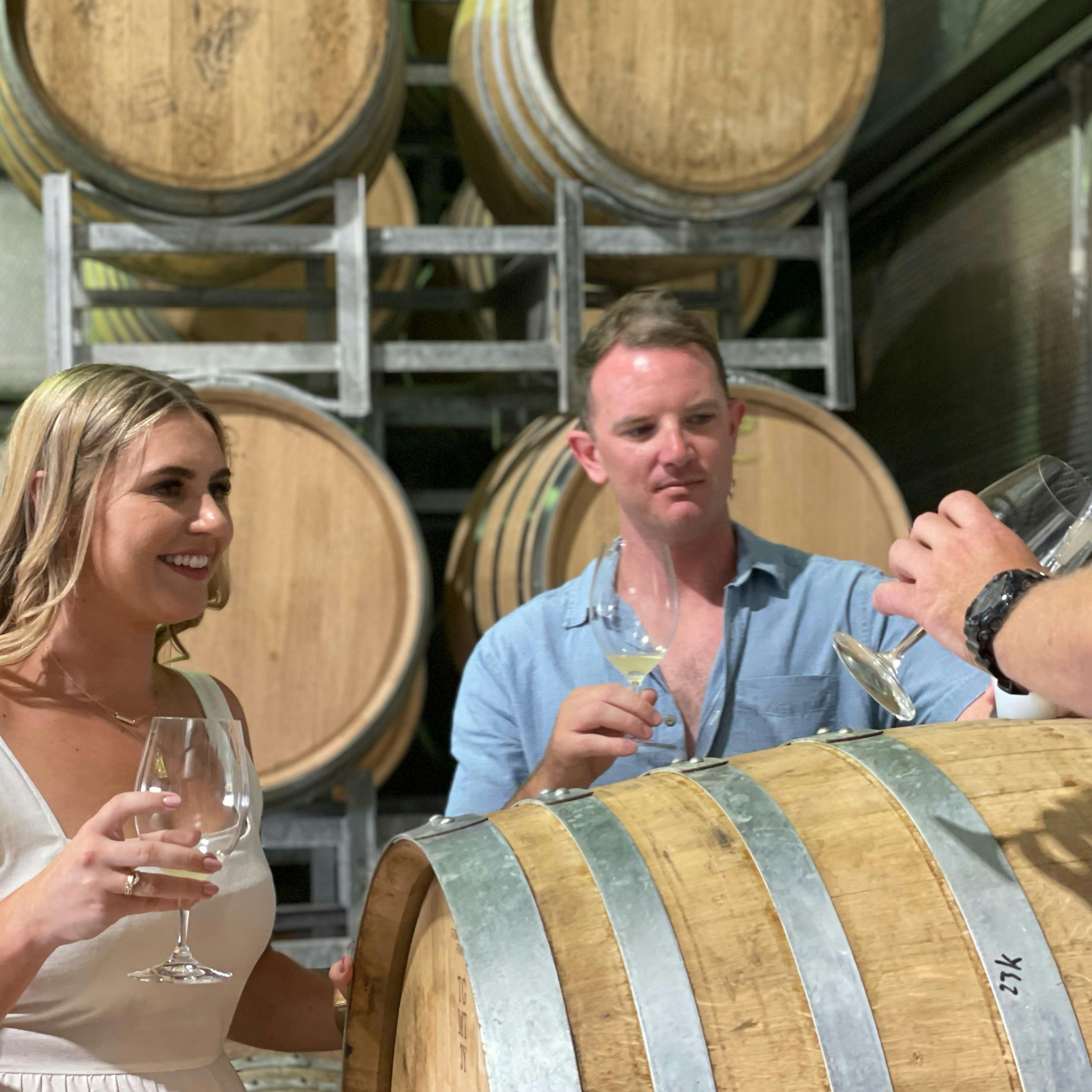 Tasting wine from barrel