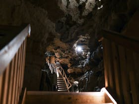 Person exiting Engelbrecht Cave