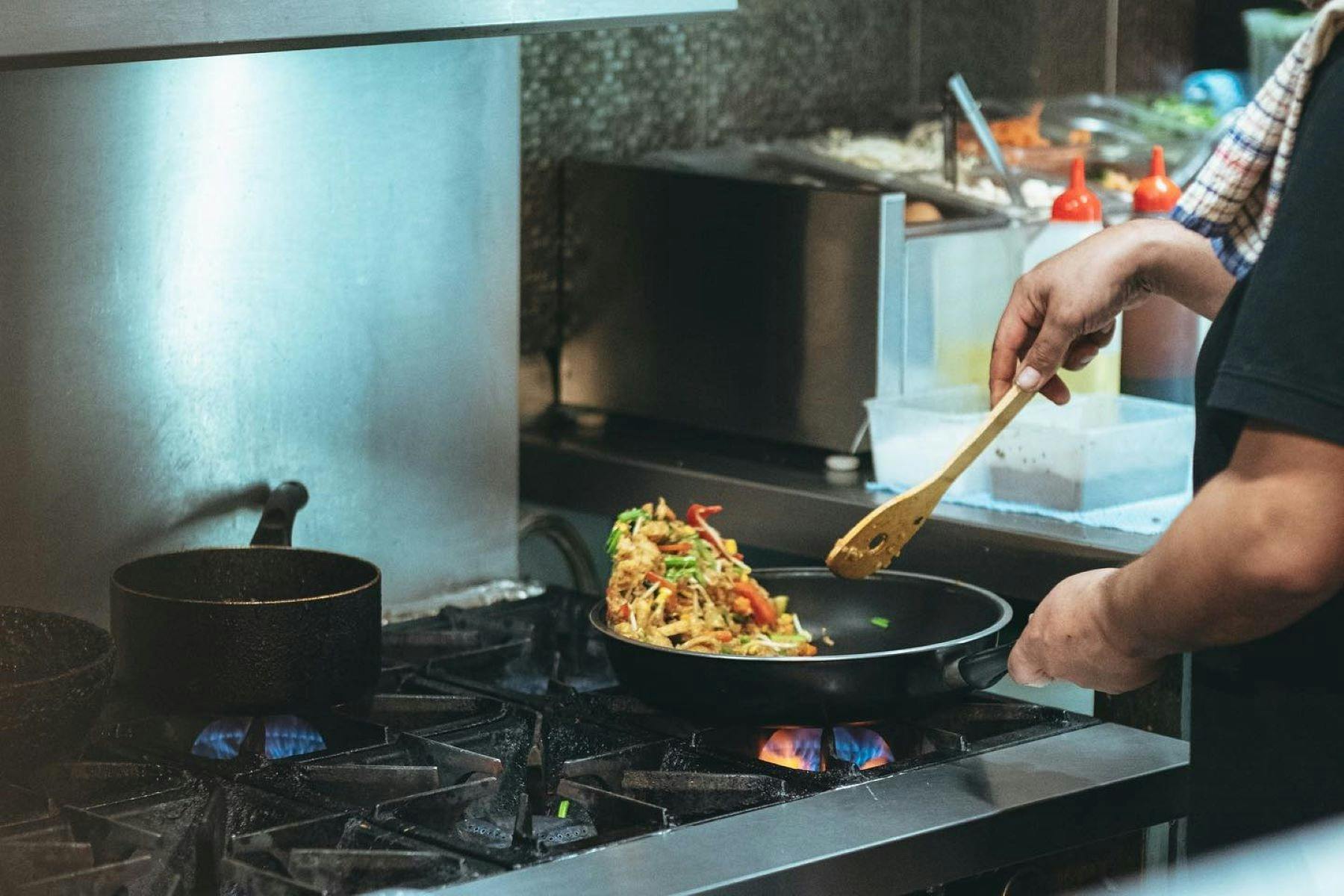 A meal being cooked on a stove