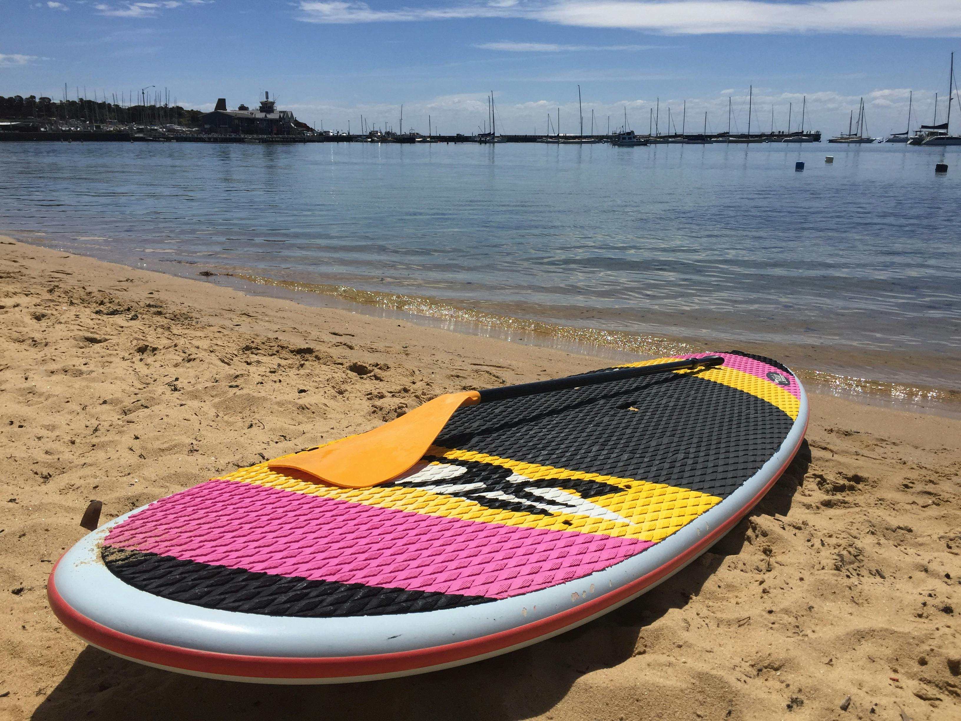 Stand Up Paddle Board Hire of the beach at Mornington