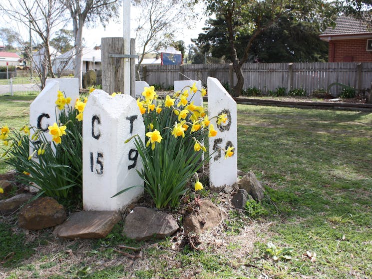 Mile posts and flowers