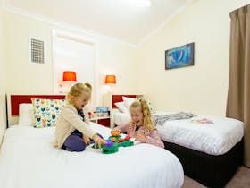 Upstairs loft with two singles, accessed via the second bedroom. Perfect for the kids.