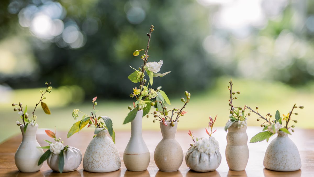 row of ceramic bud vases by PJ Pottery