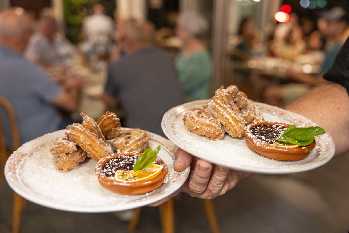 Churros with chocolate being served at Seabean Tapas Bar Restaurant, Port Douglas, Tropical Nth Qld