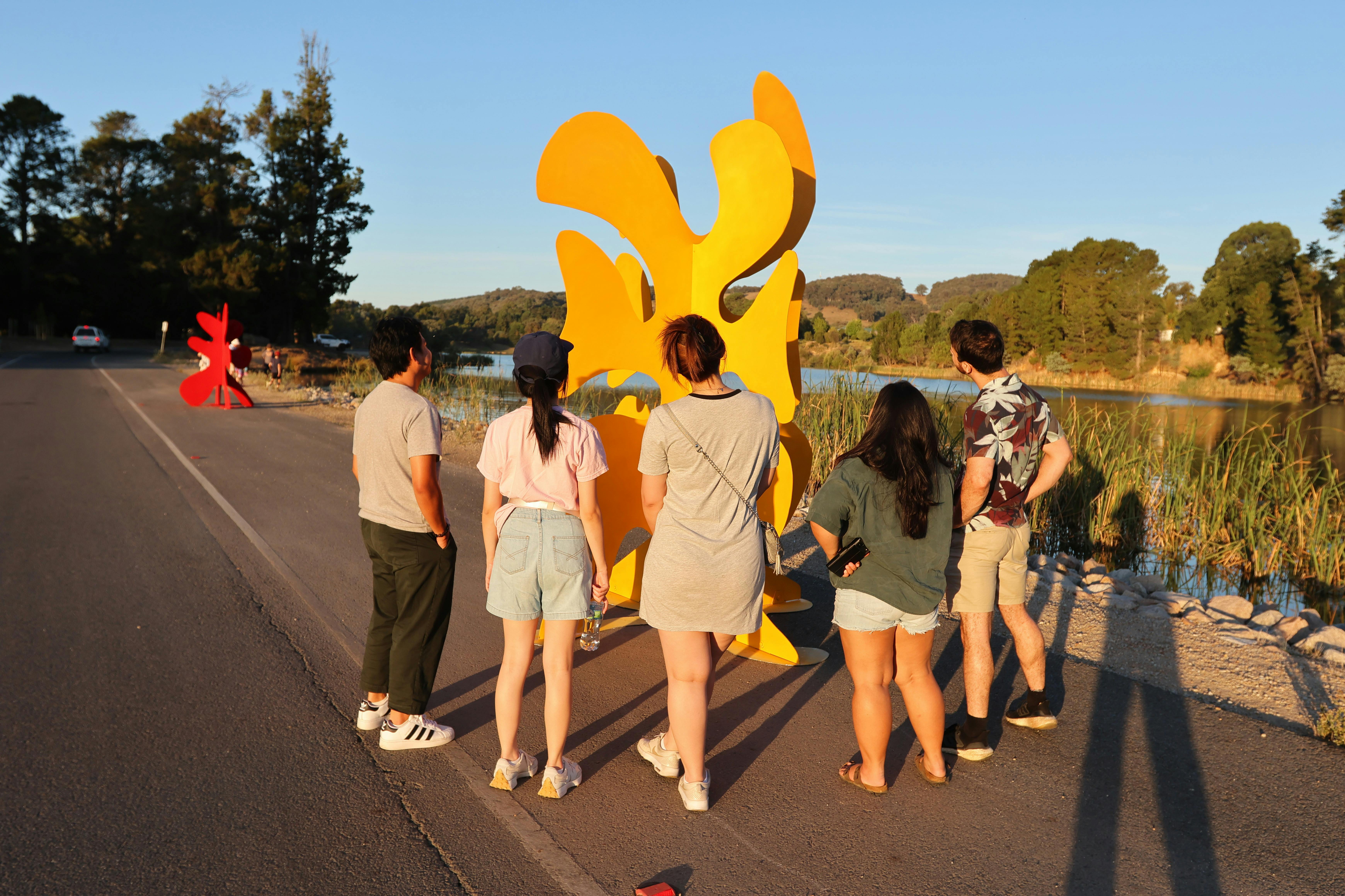 audience enjoying the sculpture