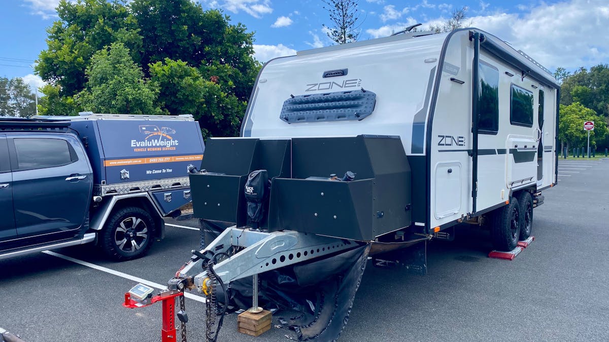 EvaluWeight branded vehicle and caravan being weighed