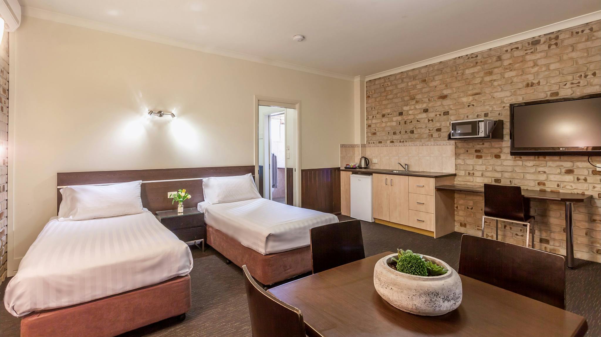 2nd bedroom with 2 x single beds & kitchenette, bathroom & queen bed through the door 2nd bedroom with 2 x single beds & kitchenette, bathroom & queen bed through the door