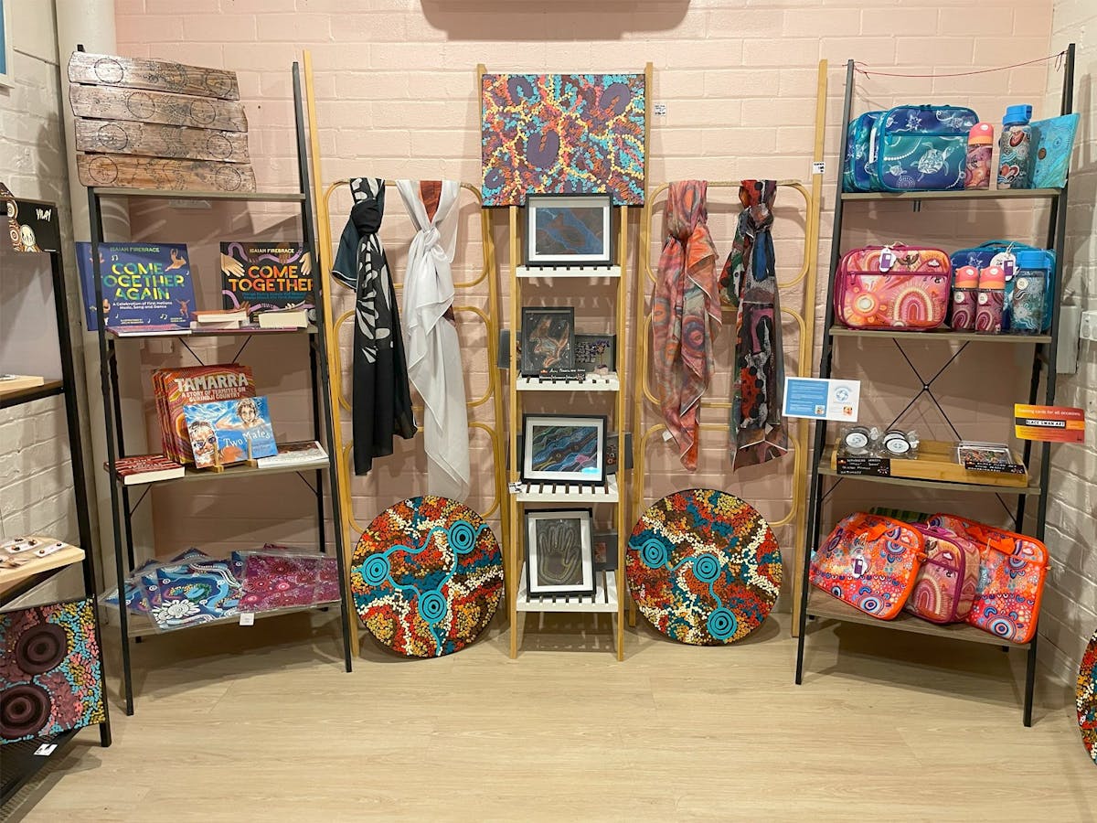 Indigenous artworks, books, scarves and bags
