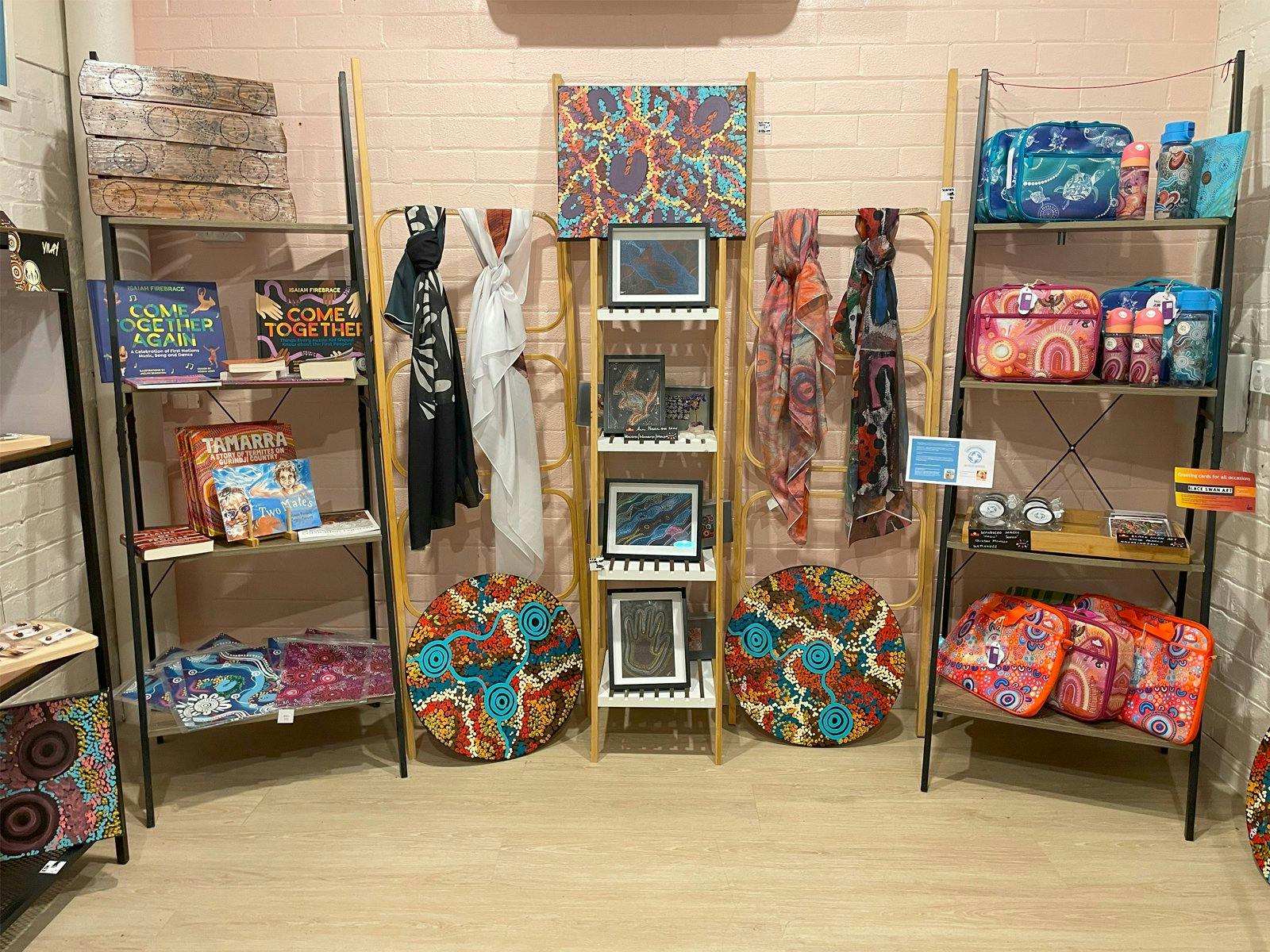 Indigenous artworks, books, scarves and bags Indigenous artworks, books, scarves and bags