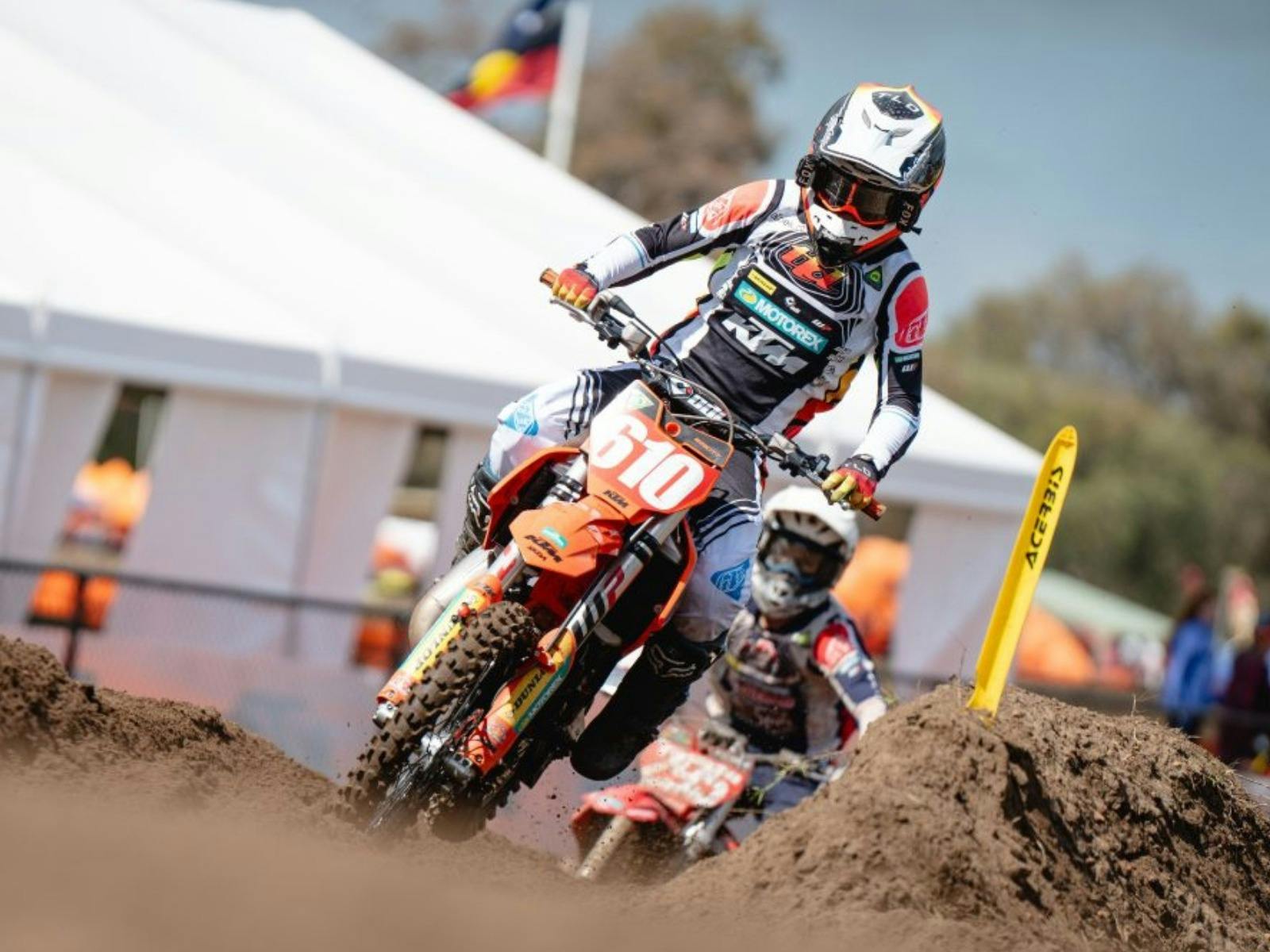 A junior motocross rider competes at the 2025 AJMX Championship