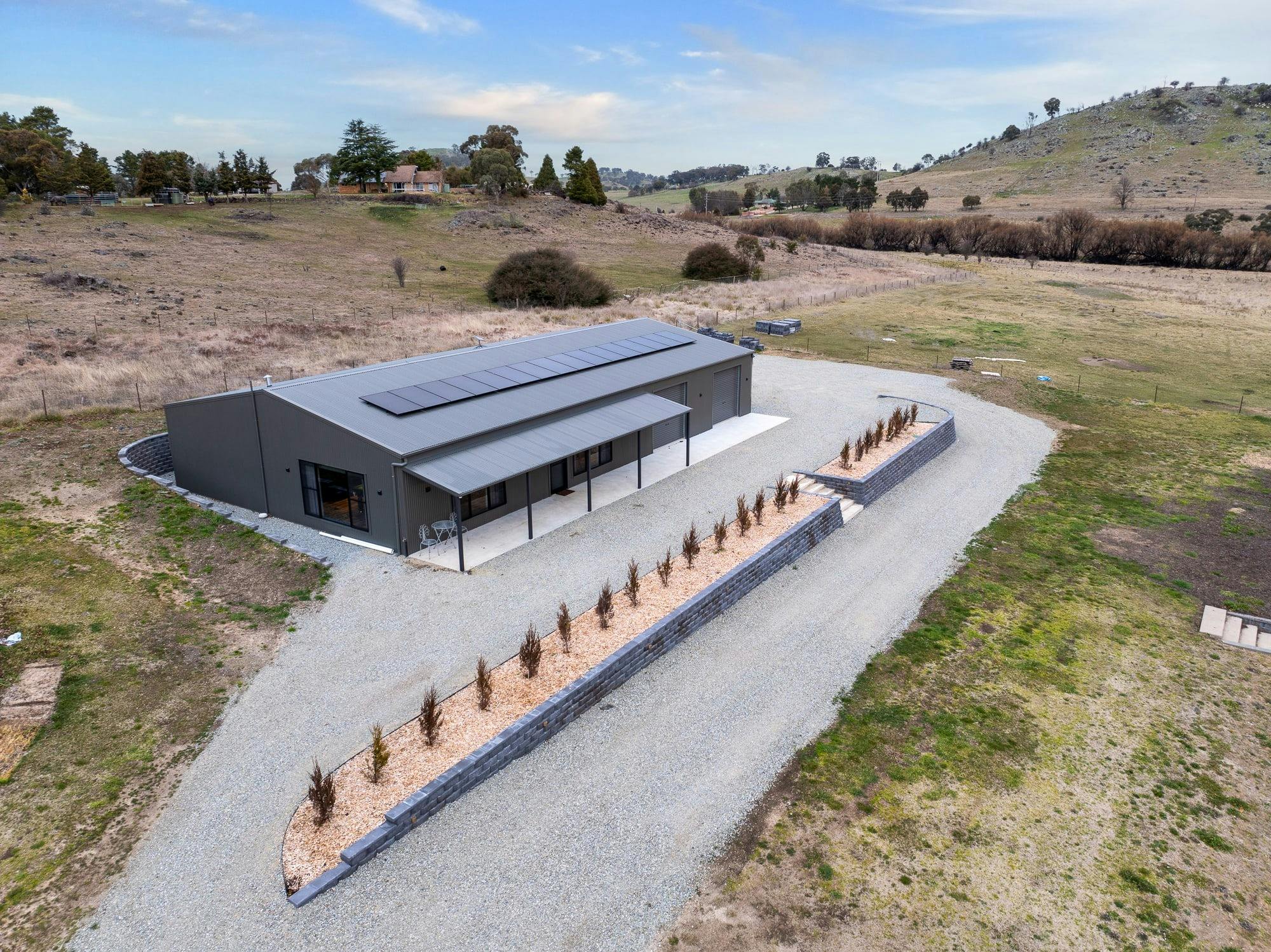 View of the whole place and front driveway