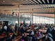 Interior of Cloud 9 building full of people enjoying lunch