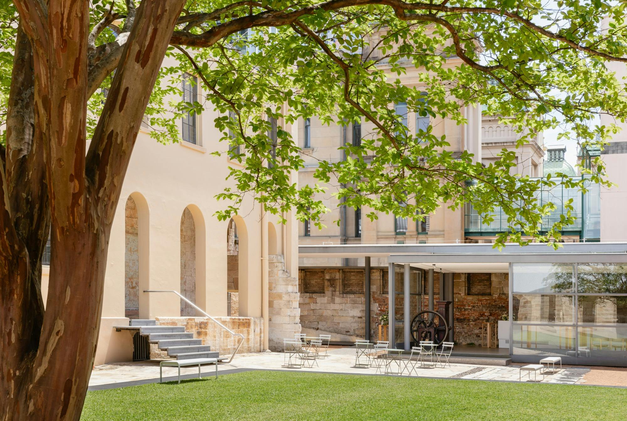 Historic courtyard with lawns and tree