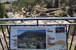 One of the interpretive signs throughout the Adelong Falls Gold Mill Ruins