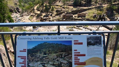 One of the interpretive signs throughout the Adelong Falls Gold Mill Ruins