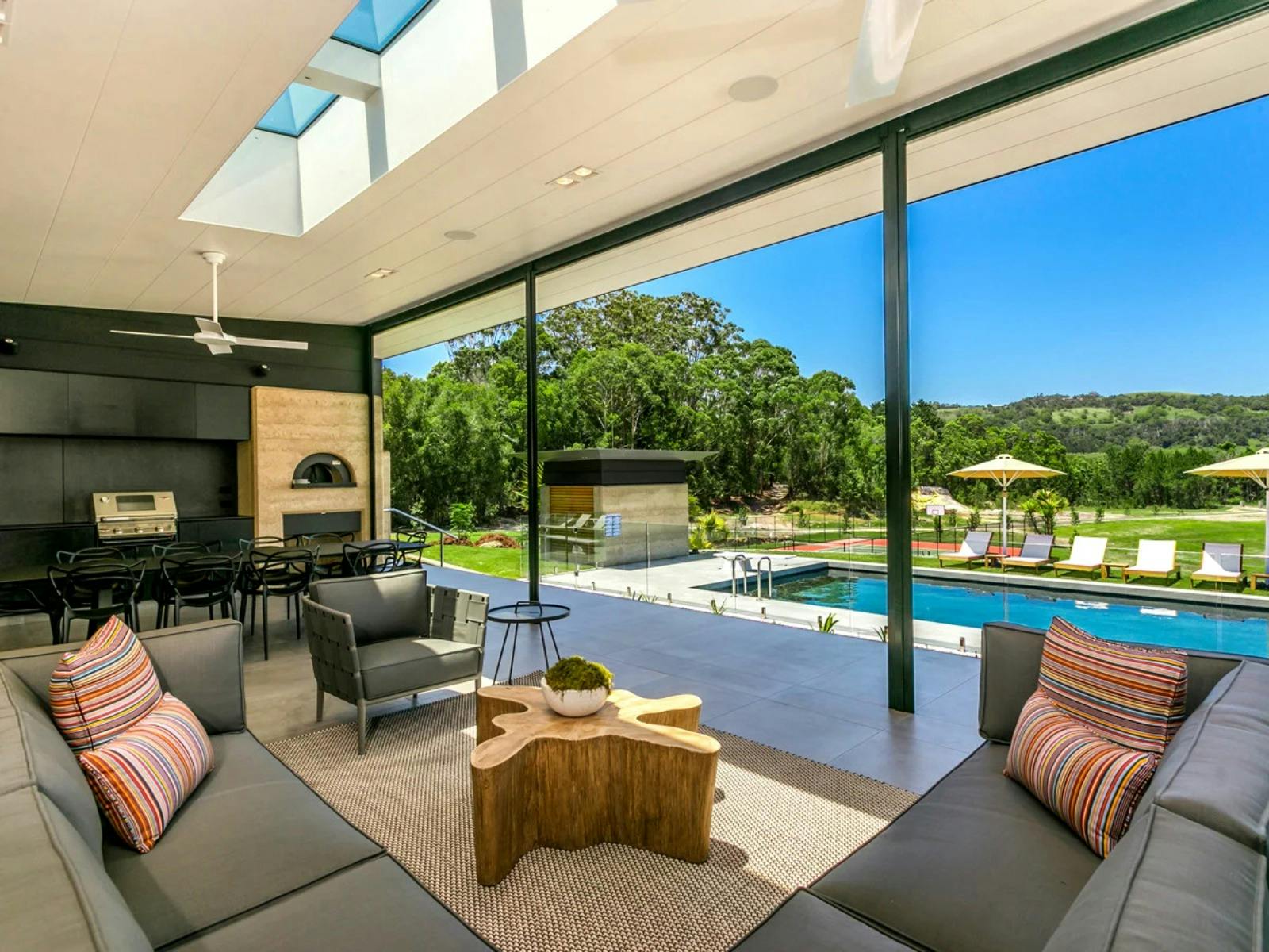 Exquisite outdoor entertaining seamlessly extends from the living area capturing picturesque views