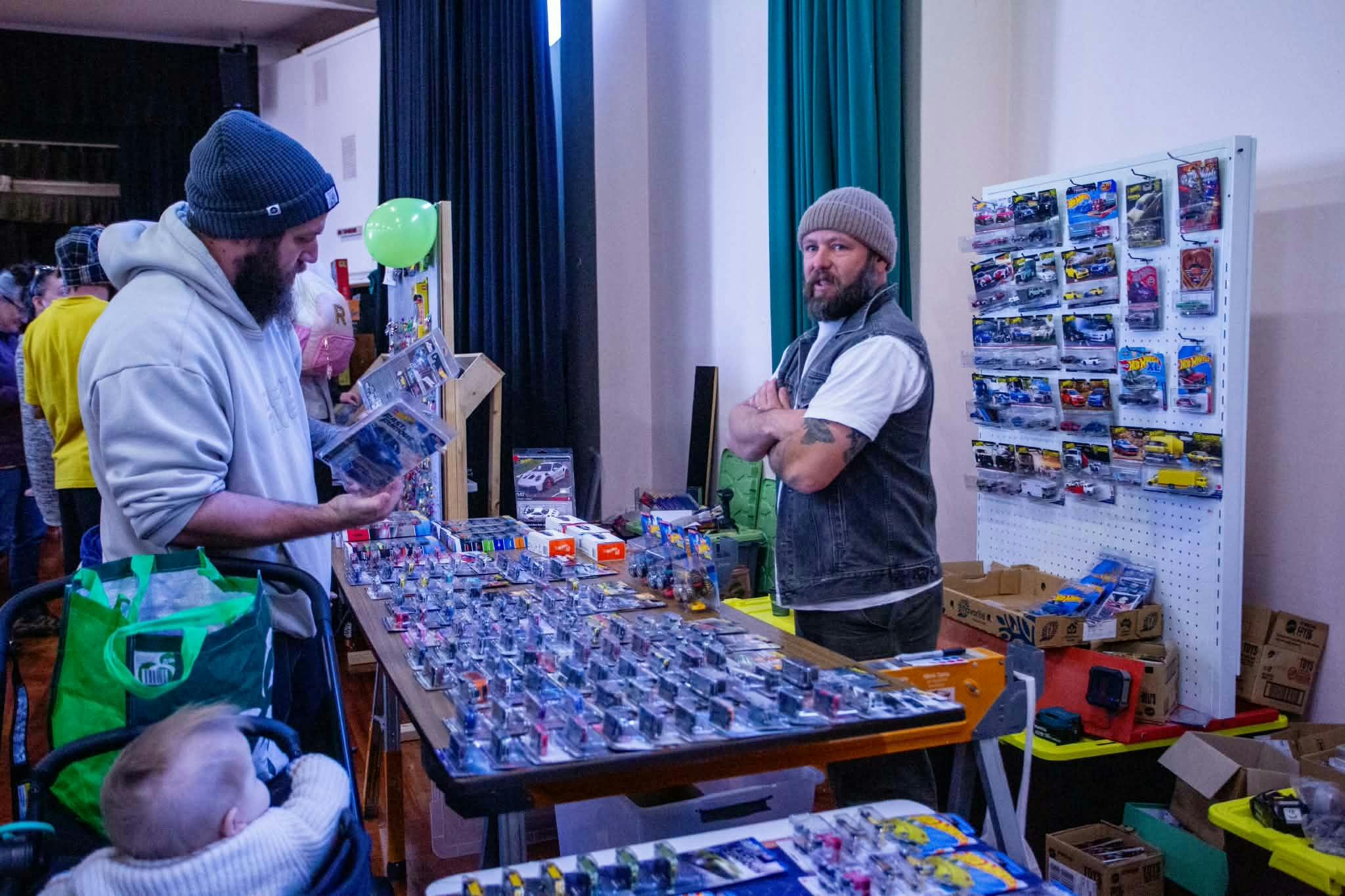 hot wheel vendor assisting customer