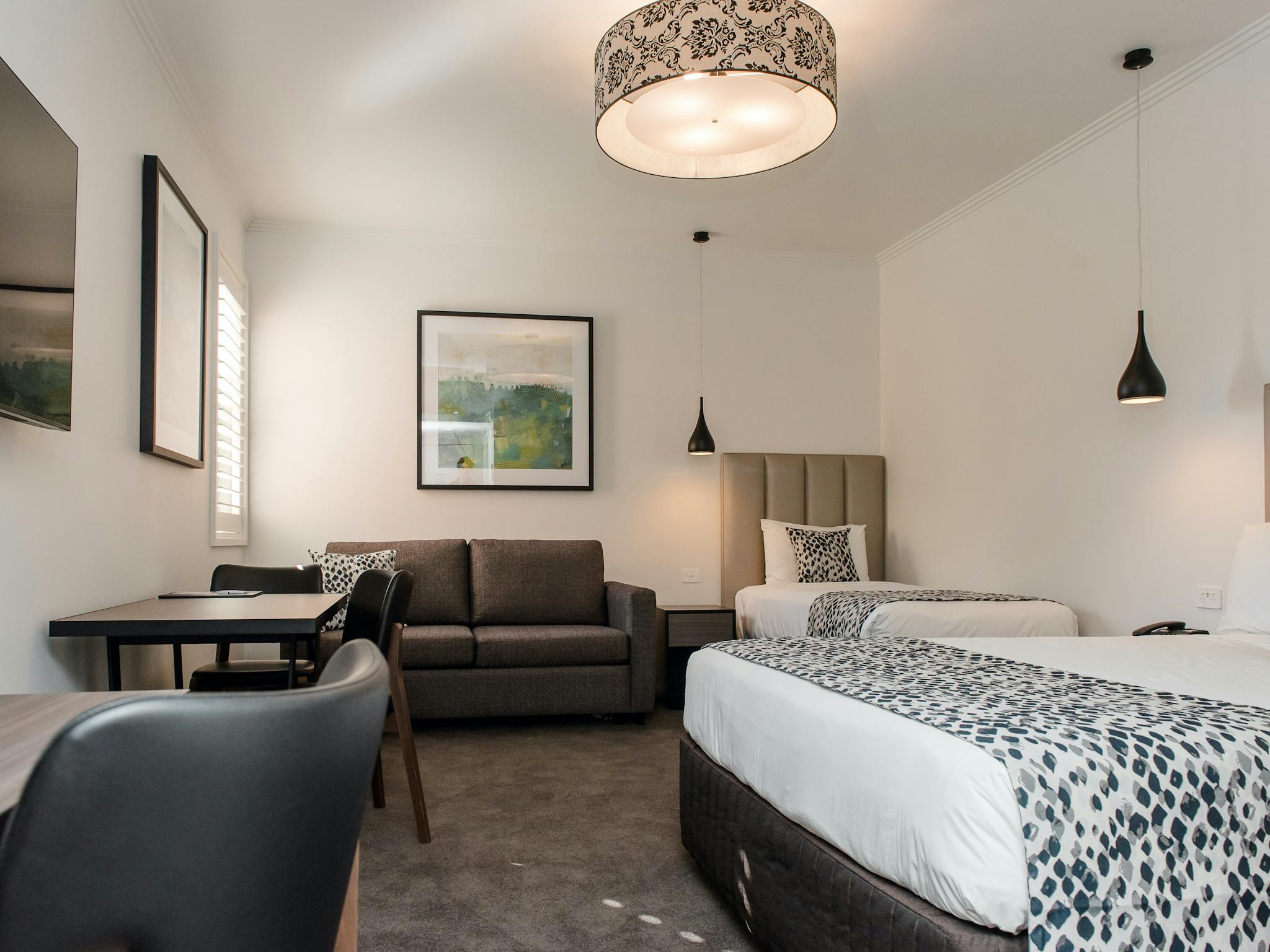 Renovated modern family suite offering queen, single and sofa bed