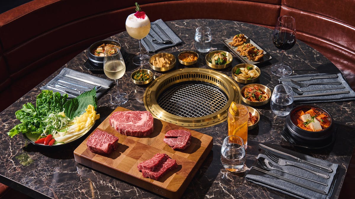 Four cuts of meat on a chopping board Four cuts of meat on a chopping board