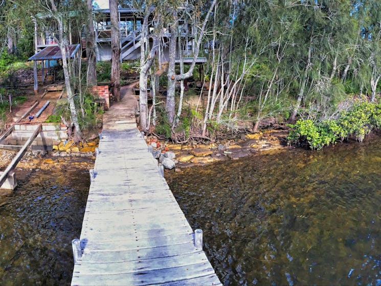 Location shot of the cottage which is just behind the main house. The jetty right on the Clyde River