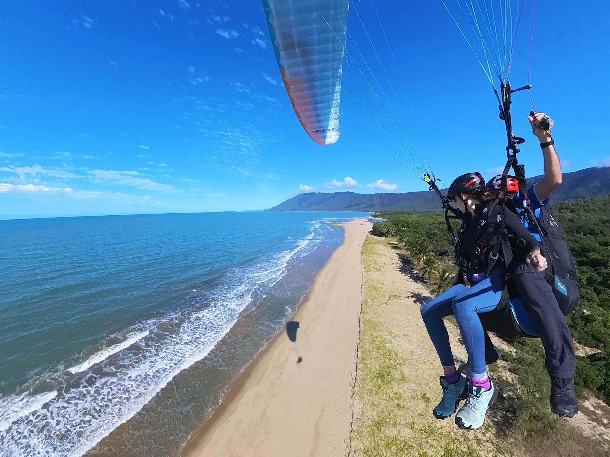 tandem paragliding along the coast tandem paragliding along the coast