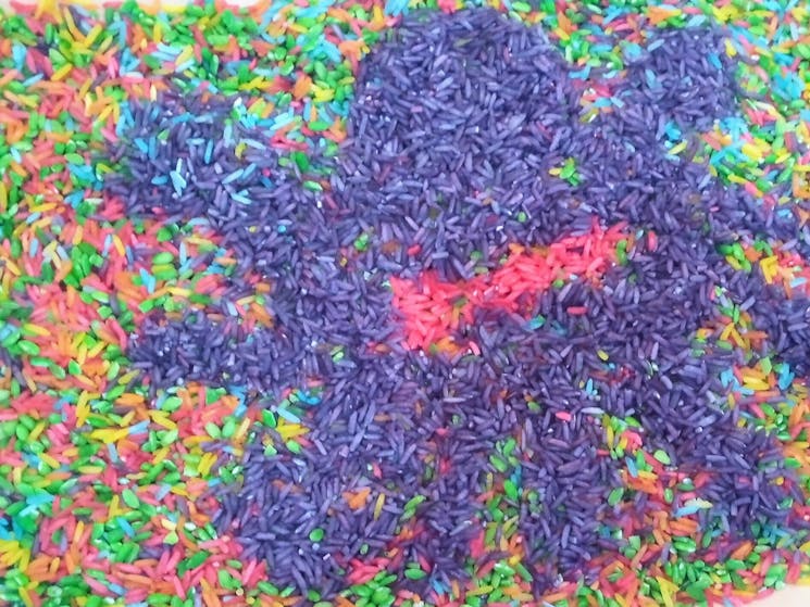 Drawing made with coloured rice