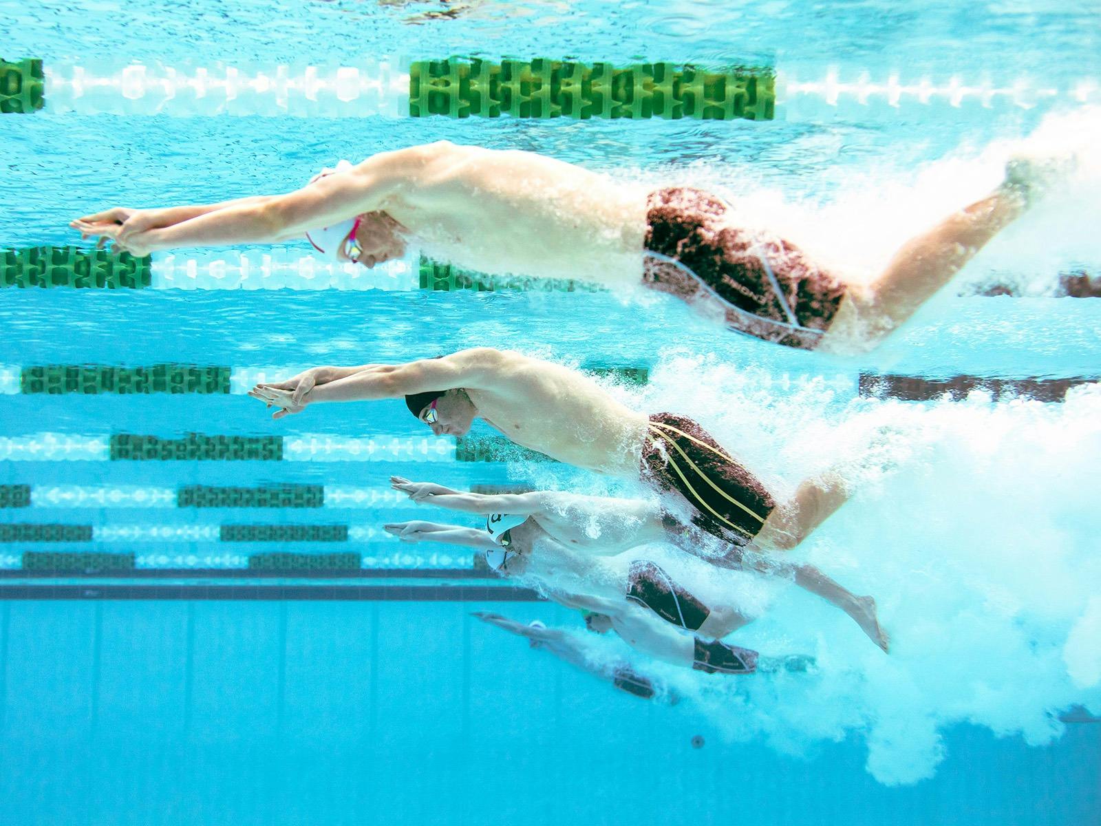 Pool rescue athletes racing
