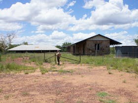 General view of the Powell Creek Telegraph Station site, with secure fencing and gated  entry.
