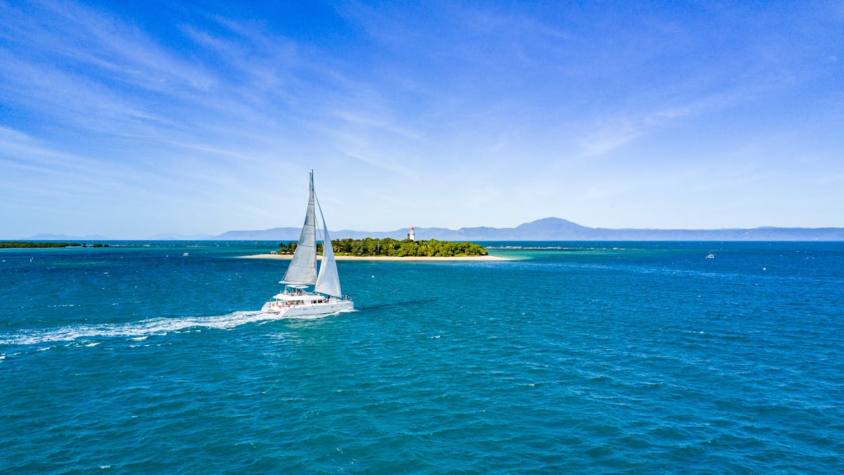 Sailaway Low Isles 56ft catamaran sailing passed Low IslesPort Douglas on the Great Barrier Reef