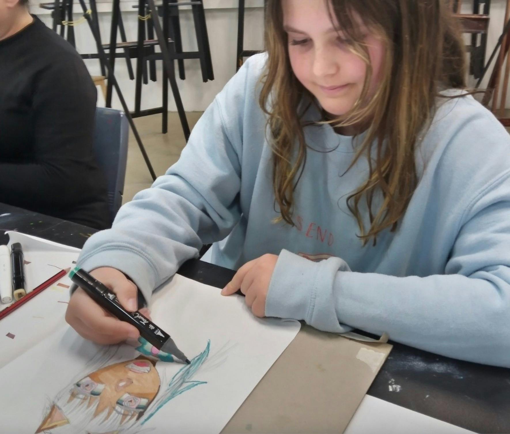 scribble cat studios student drawing manga character