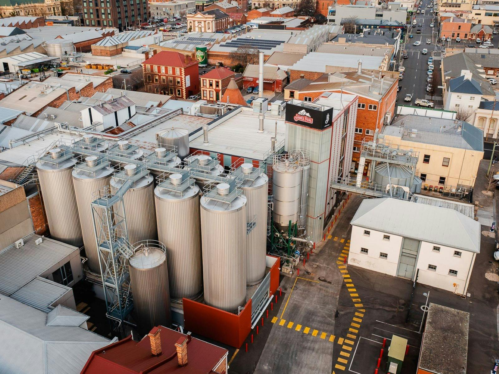 A drone shot of the brewery from very high.